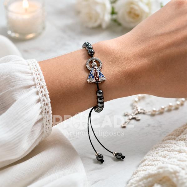 Pulseira Nossa Senhora Aparecida de Hematita 6 mm – Kit com 12 Unidades